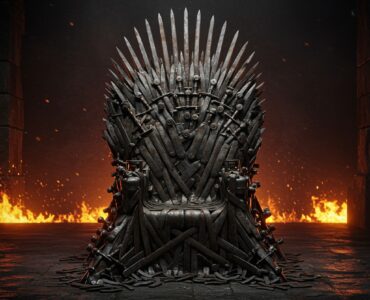 Ornate iron throne made of swords with flames burning on either side