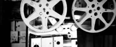 Black and white photo of a vintage film projector